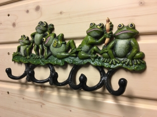 Coat rack with frogs